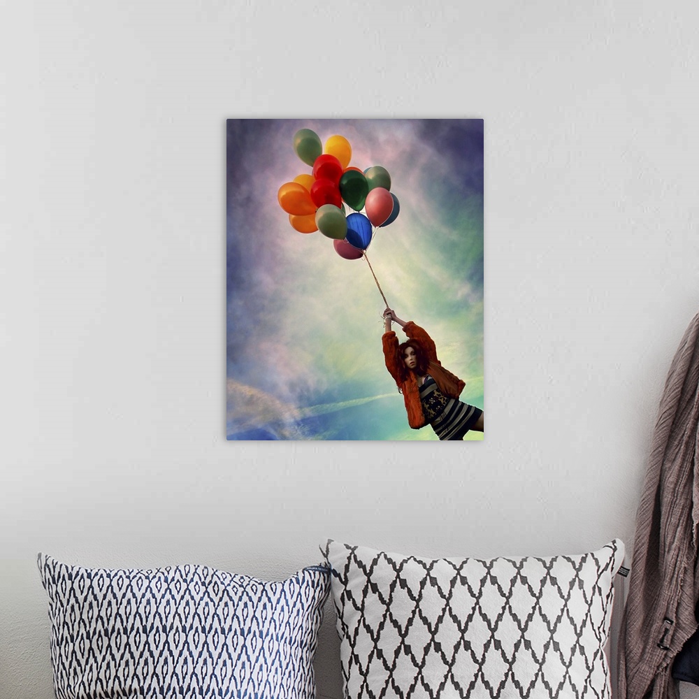 A bohemian room featuring A young woman holding balloons