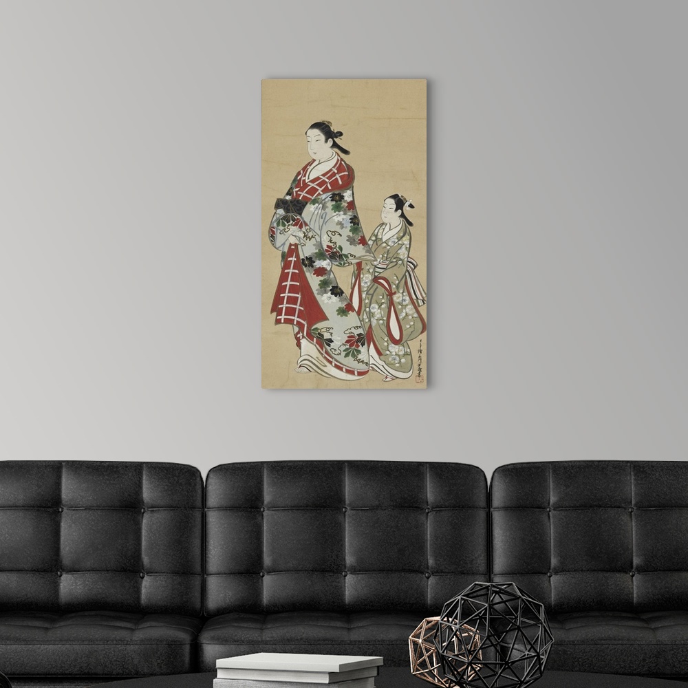 A modern room featuring Two women in traditional Japanese dress.