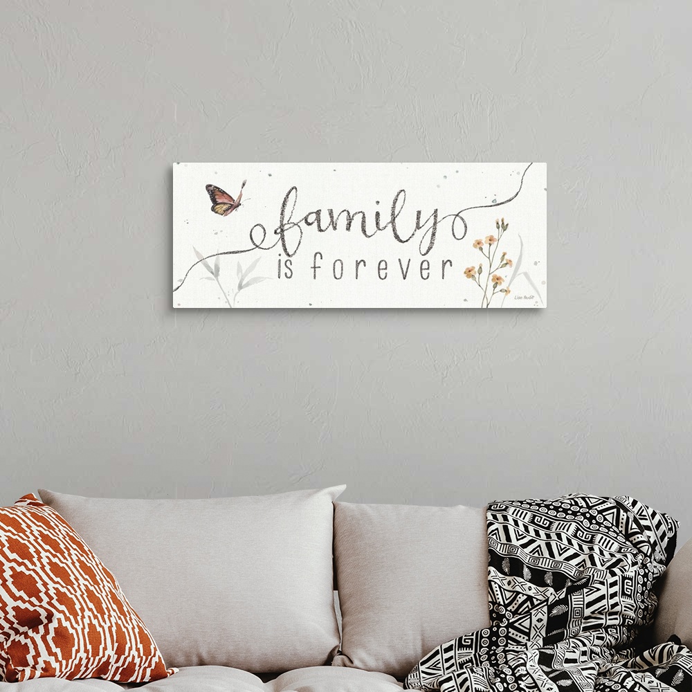 A bohemian room featuring Decorative artwork featuring the words, 'family is forever'.