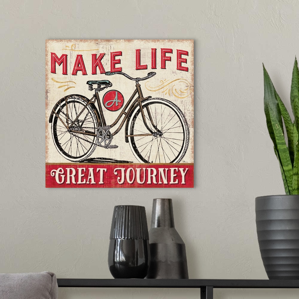 A modern room featuring Vintage style poster of a bicycle with an inspirational saying.