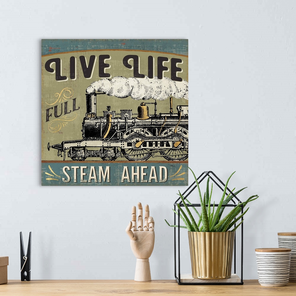A bohemian room featuring Vintage style poster of a steam train with an inspirational saying.