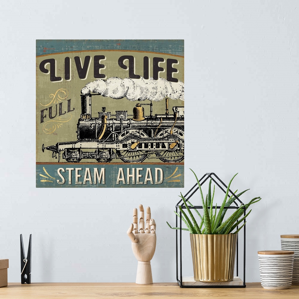 A bohemian room featuring Vintage style poster of a steam train with an inspirational saying.