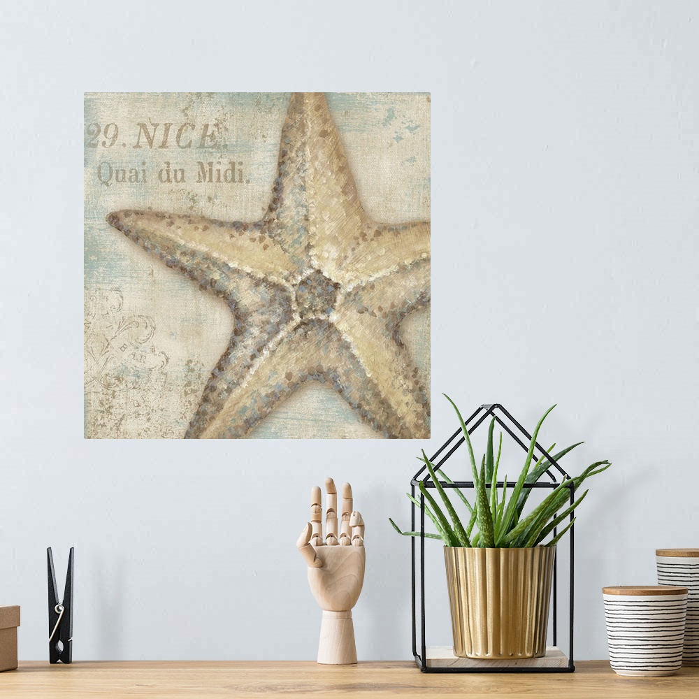 A bohemian room featuring Artwork of starfish with the text "29. Nice. Quai du Midi" in beach colors.
