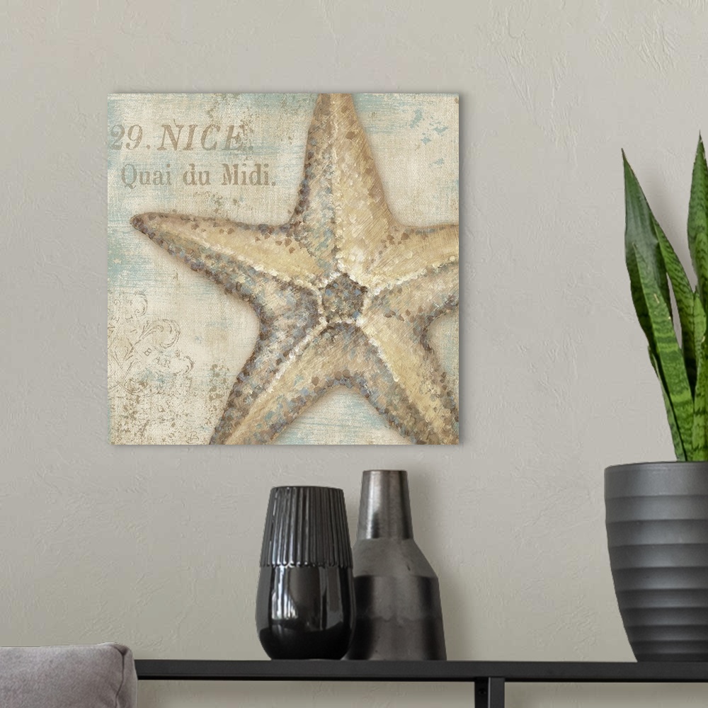 A modern room featuring Artwork of starfish with the text "29. Nice. Quai du Midi" in beach colors.