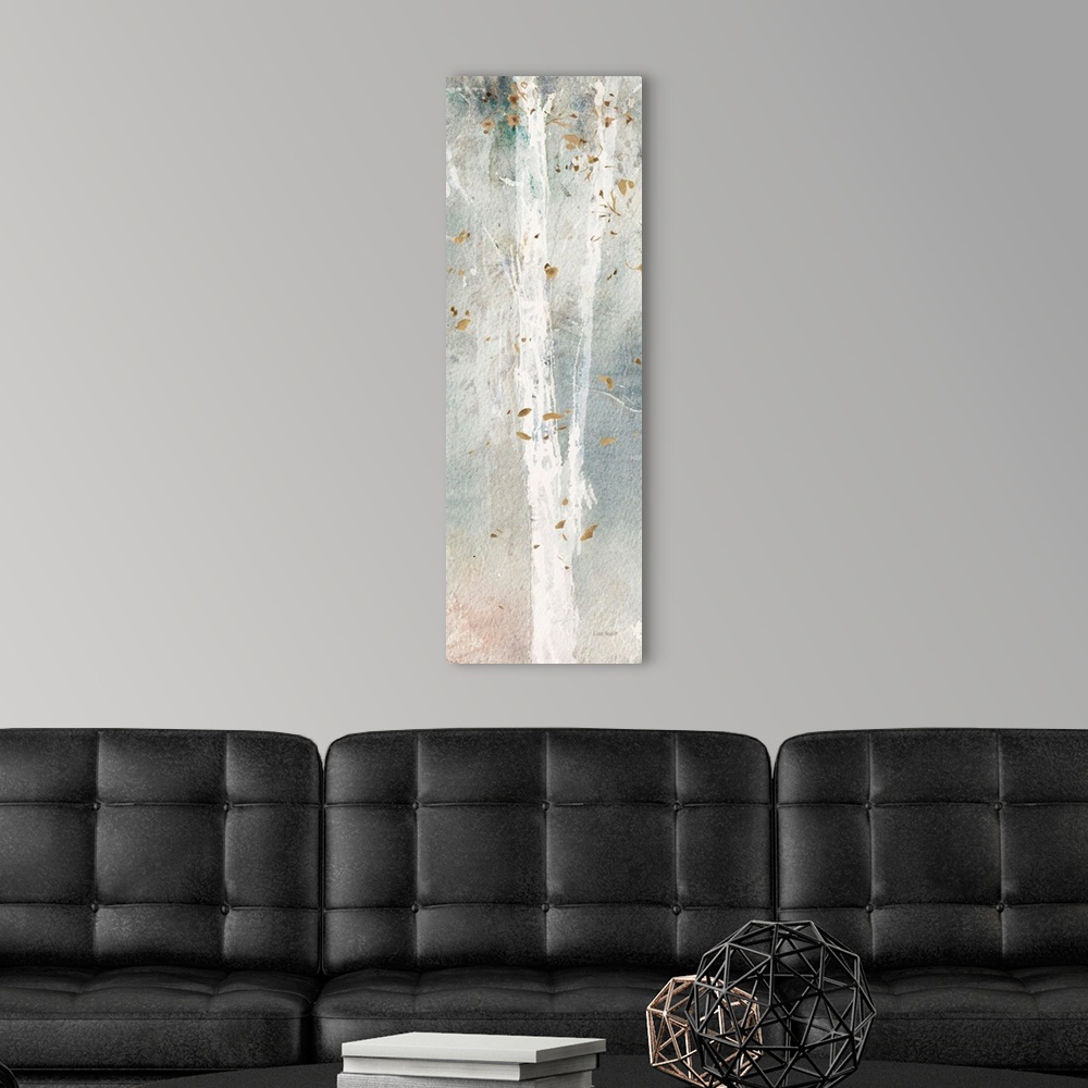 A modern room featuring Decorative artwork of a white slender trees with fluttering brown leaves over a subdued gradated ...