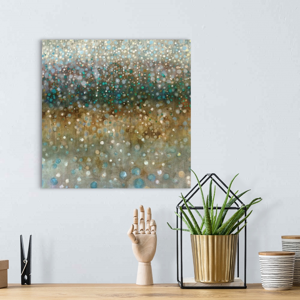 A bohemian room featuring An abstract painting of what resembles glittering rain falling in blue and brown tones.