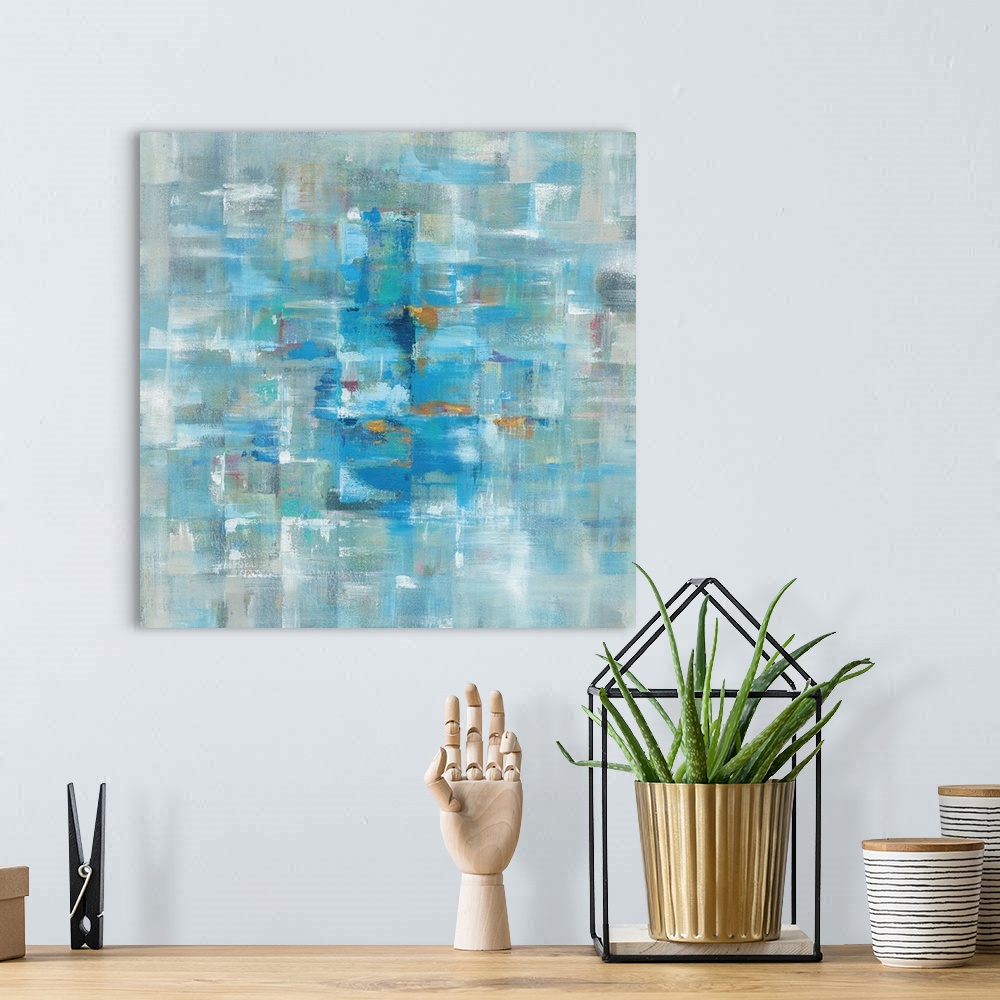 A bohemian room featuring Abstract contemporary artwork in cool blue tones.