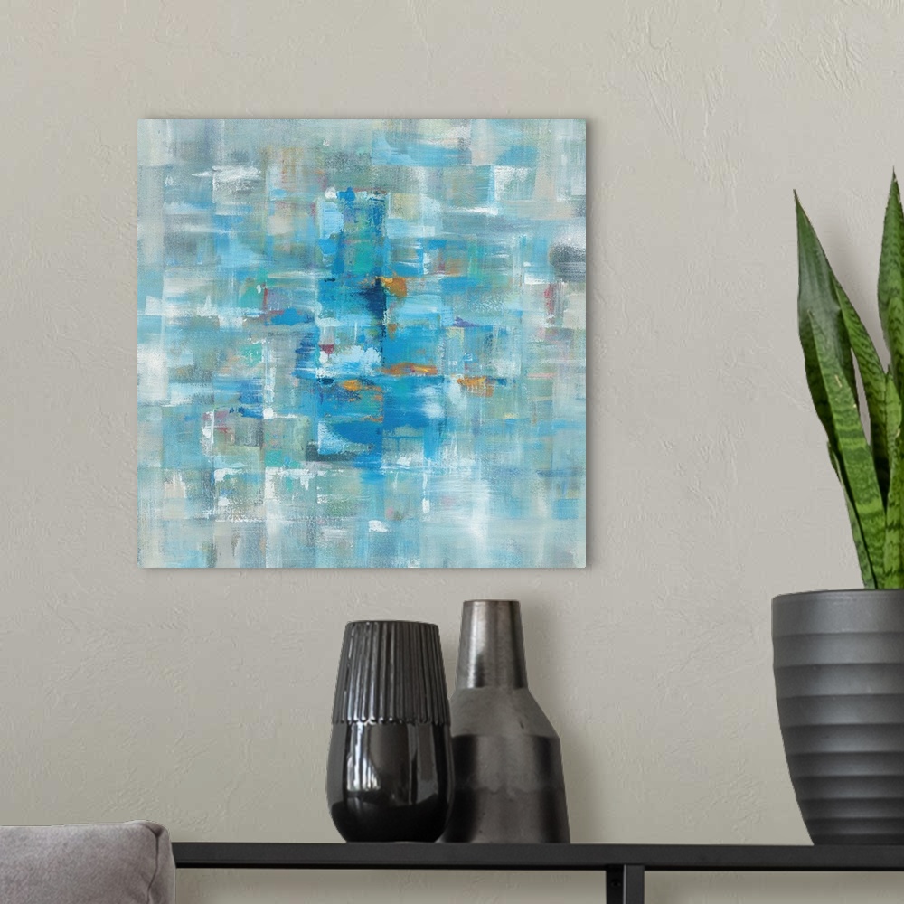 A modern room featuring Abstract contemporary artwork in cool blue tones.