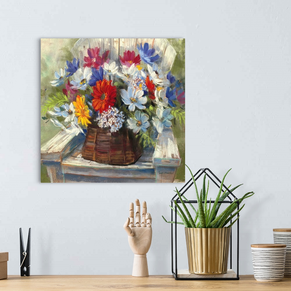 A bohemian room featuring Contemporary painting of a basket of flowers sitting on wooden deck chair.