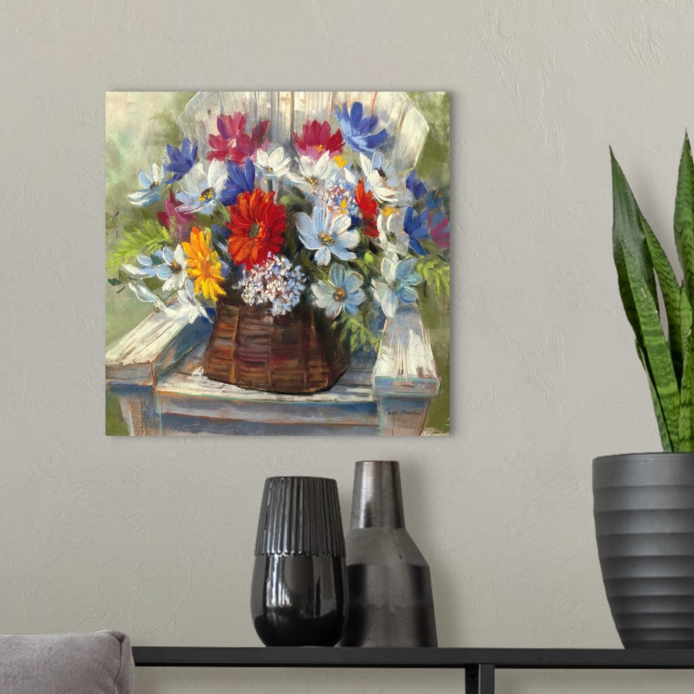 A modern room featuring Contemporary painting of a basket of flowers sitting on wooden deck chair.