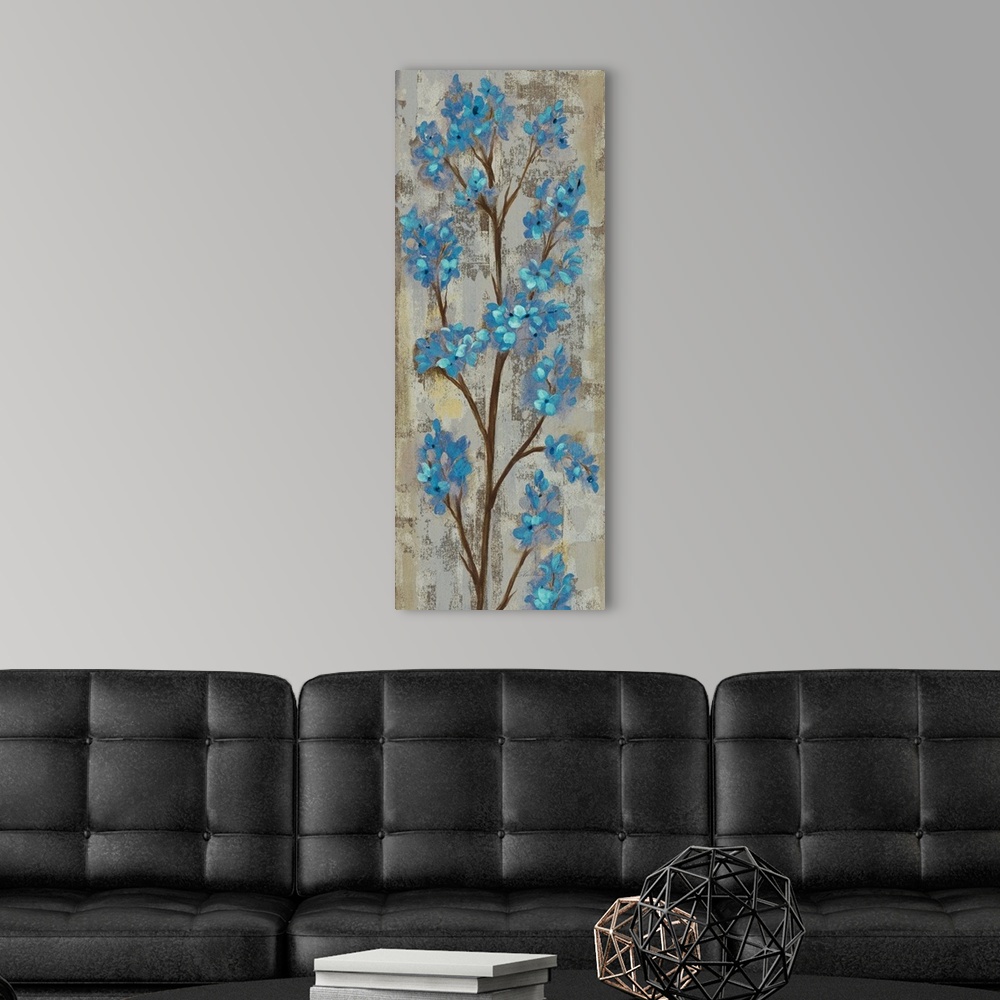 A modern room featuring Tall vertical artwork of blue contemporary flowers over distressed background.