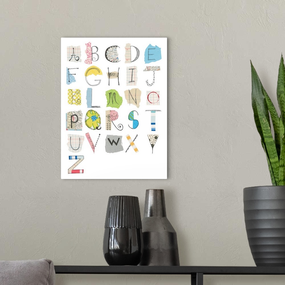 A modern room featuring An alphabet of letters made from clippings of random print.