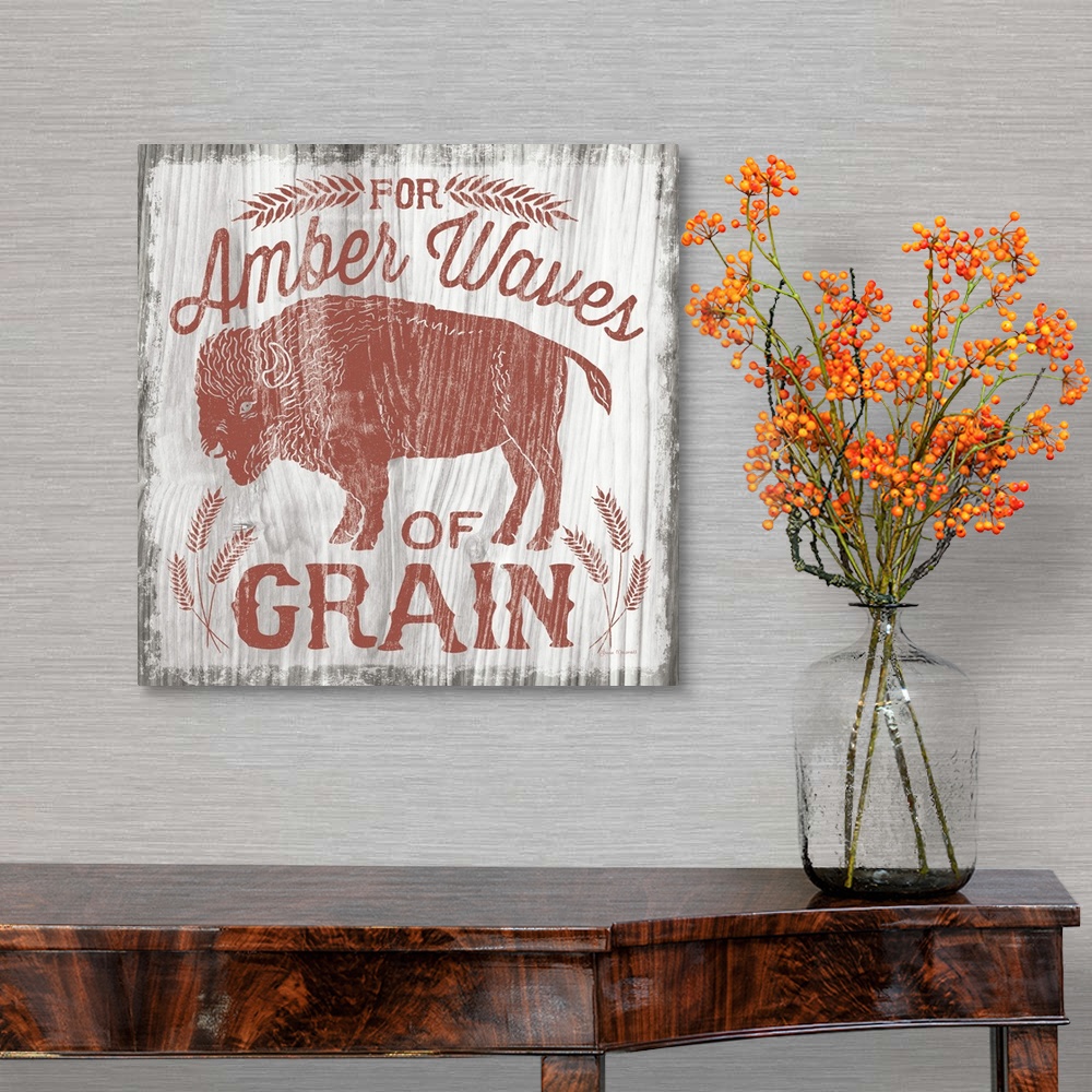 A traditional room featuring Contemporary cabin themed artwork of a distressed sign.
