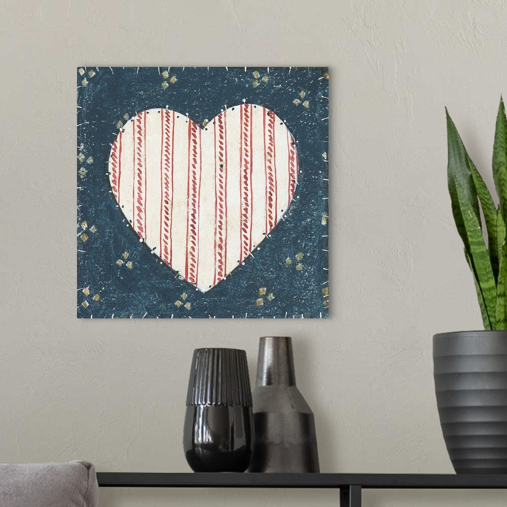 A modern room featuring Red, White, and Blue painting of a heart.