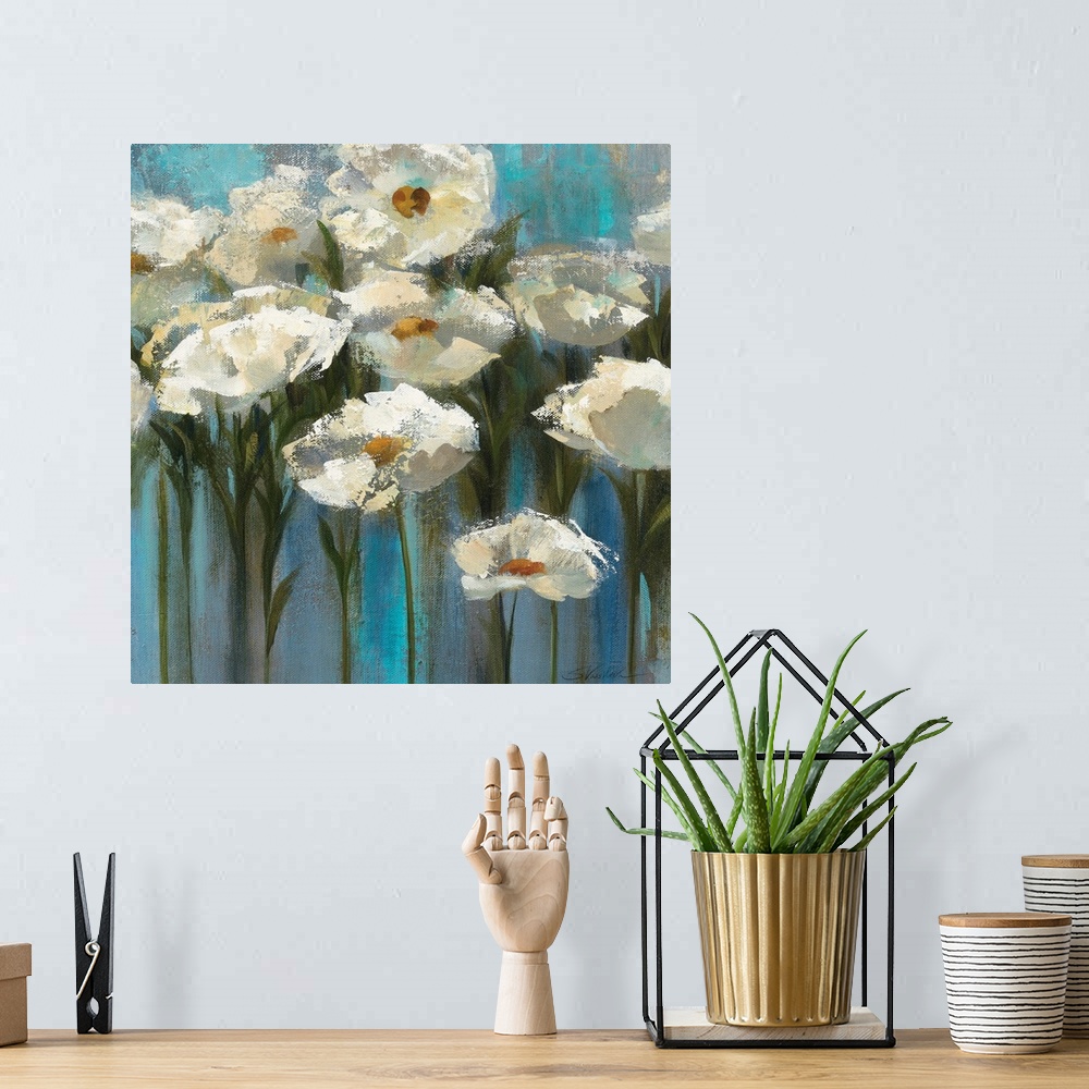 A bohemian room featuring Contemporary floral painting of blooming white flowers and stems sticking up on a texture cool ba...