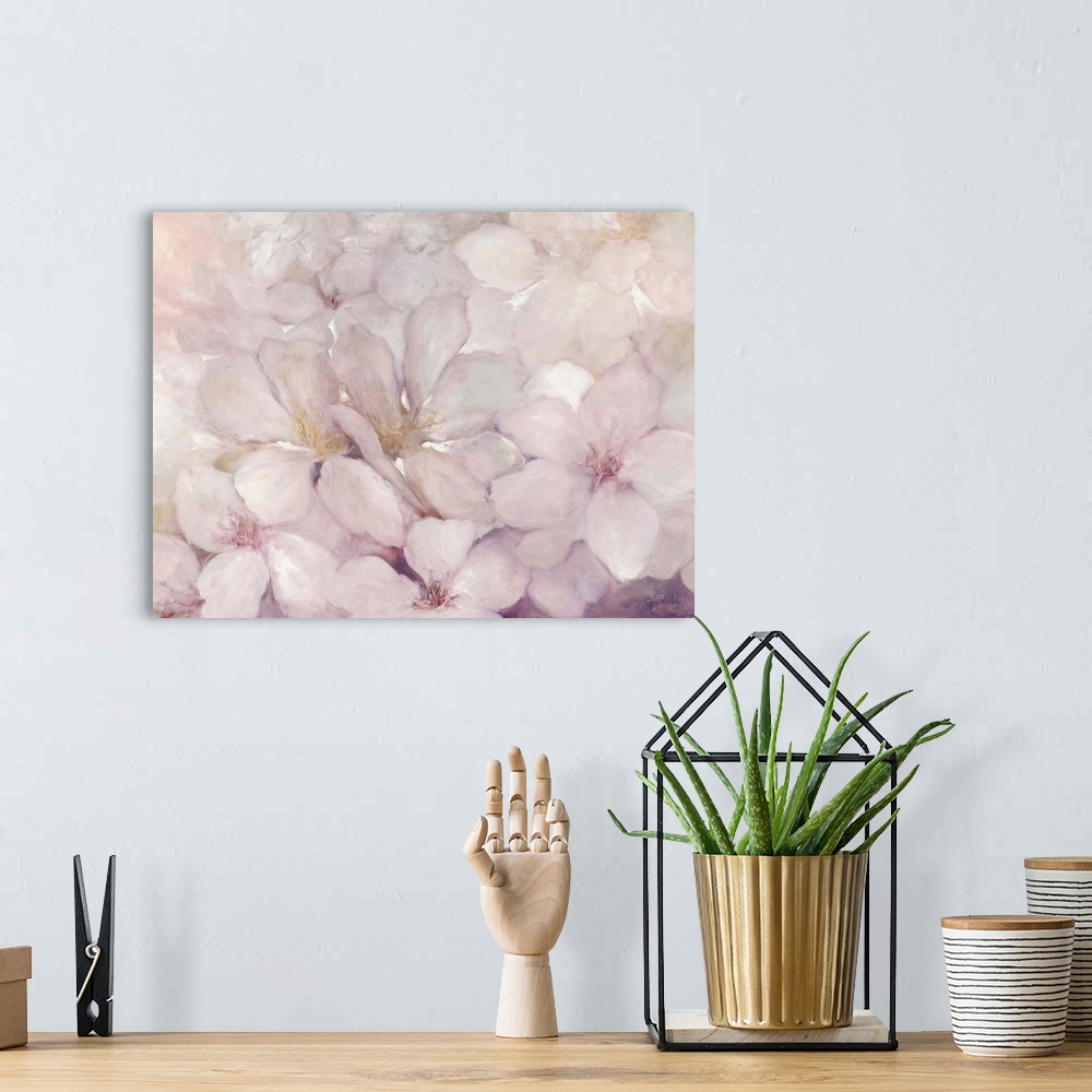 A bohemian room featuring Abstract painting of apple blossom flowers with warm pink and purple tones.