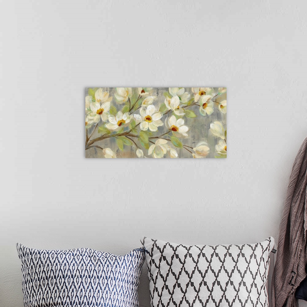 A bohemian room featuring Contemporary painting of magnolia flowers against a pale green background.
