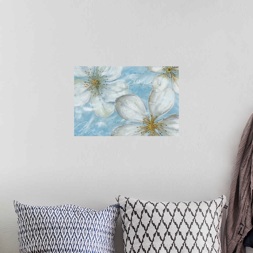 A bohemian room featuring Floral drawing of three large magnolia blossoms on a textured blue background.
