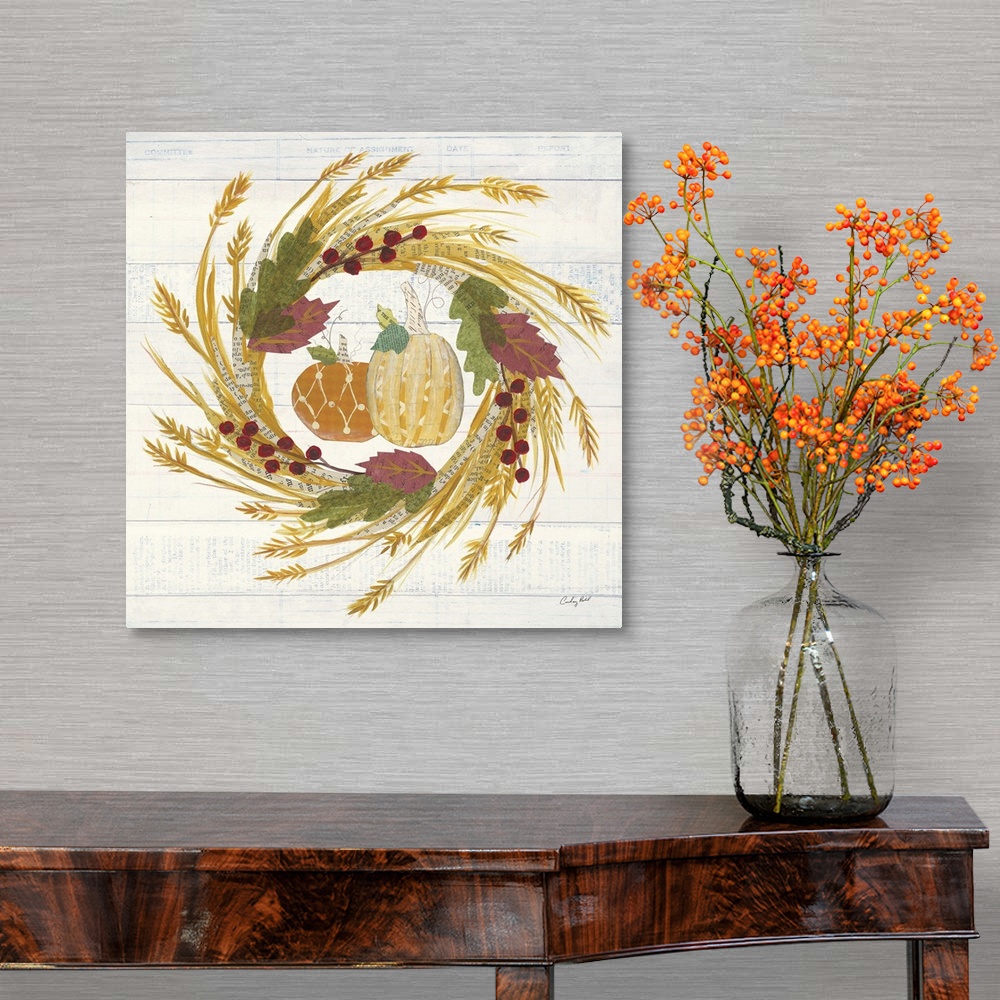 A traditional room featuring Decorative artwork of a wreath of fall leaves with pumpkins and a white wood background.