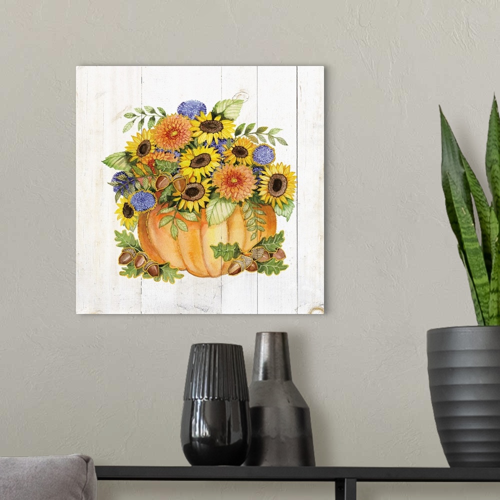 A modern room featuring A square Fall decorative piece with an arrangement of flowers and pumpkins on a white wood panele...