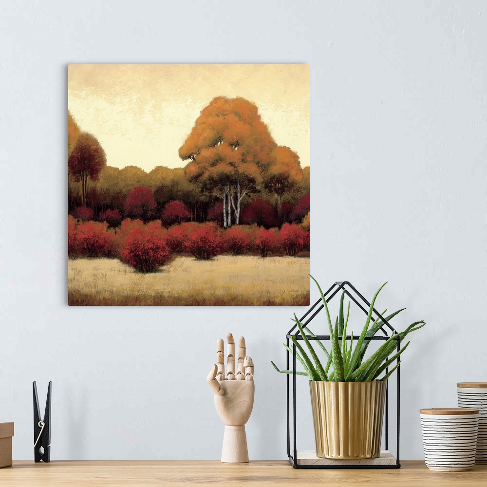 A bohemian room featuring Square home art docor on a large canvas of a warm landscape of trees and bushes on a golden backg...