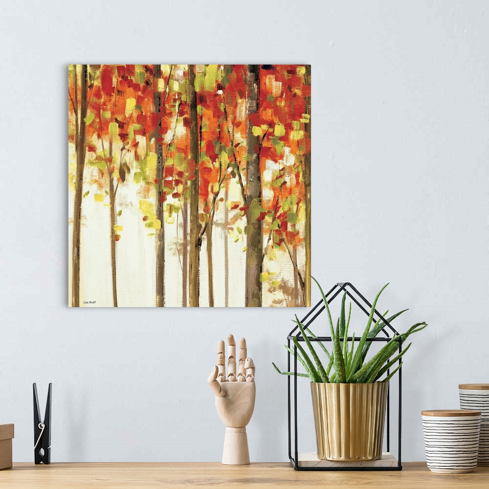 A bohemian room featuring Contemporary painting of tree tops covered in fall colored foliage.