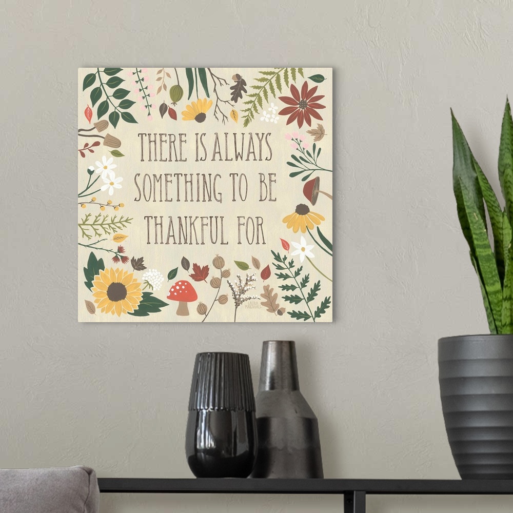 A modern room featuring "There is always something to be thankful for" written on a tan background and surrounded by Autu...