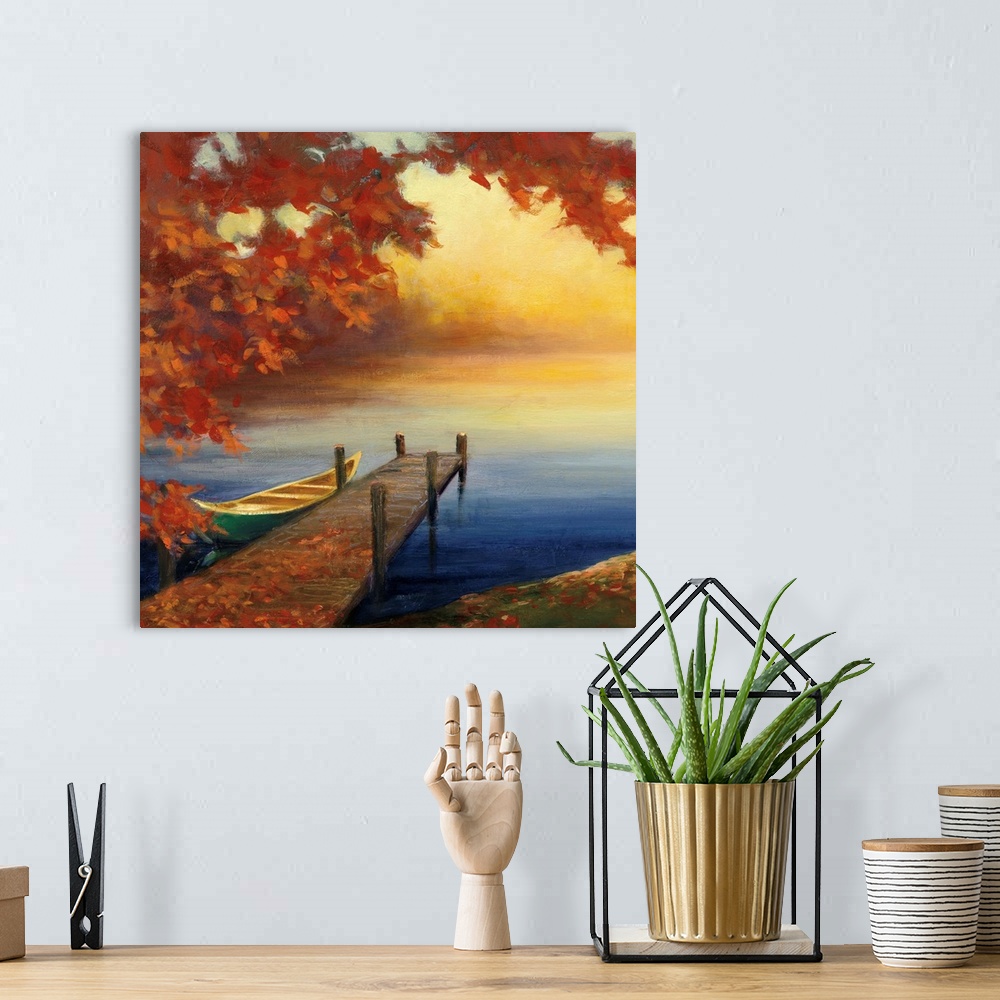 A bohemian room featuring Contemporary artwork of a small pier with a boat in a lake with fall leaves.