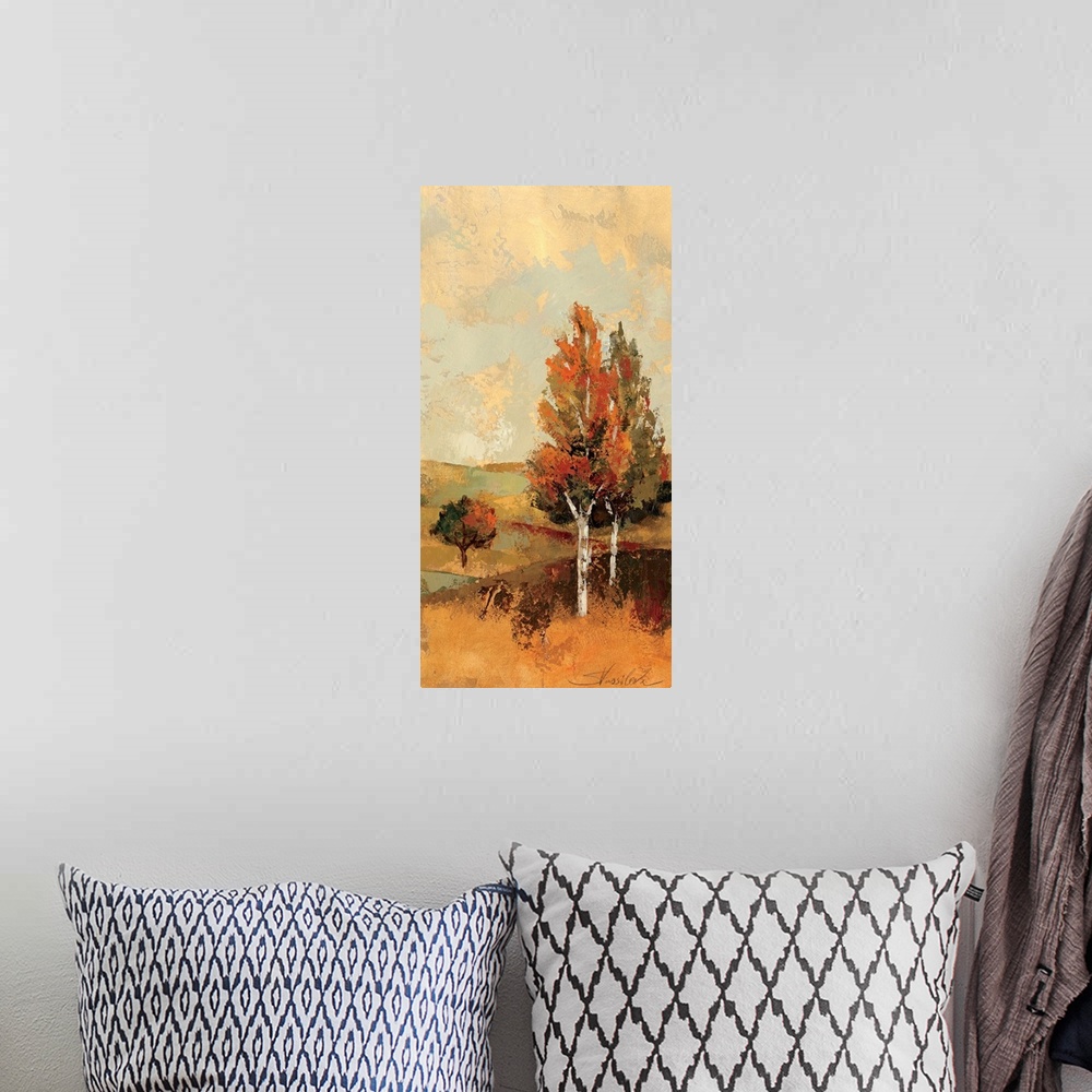 A bohemian room featuring Portrait, large wall painting of a fall scene of rolling hills and several trees with autumn colo...