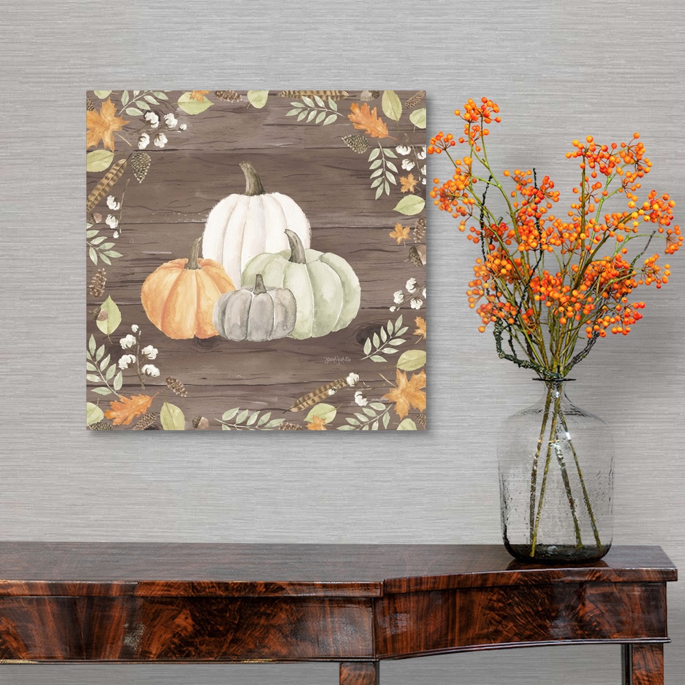 A traditional room featuring Decorative artwork of fall leaves framing a group of pumpkins and a brown wood background.