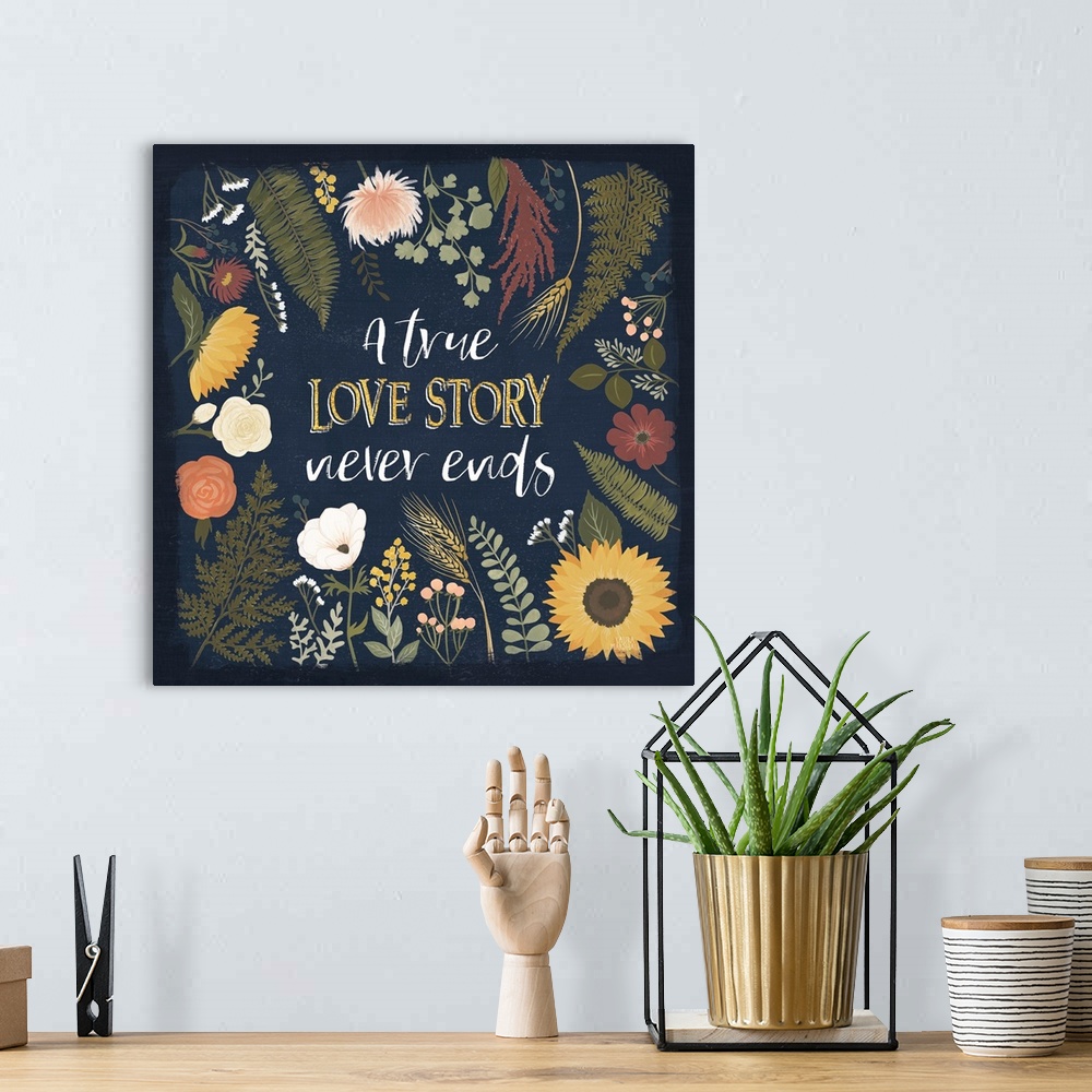 A bohemian room featuring Decorative floral artwork featuring autumn colors and the words, 'A true love story never ends'.