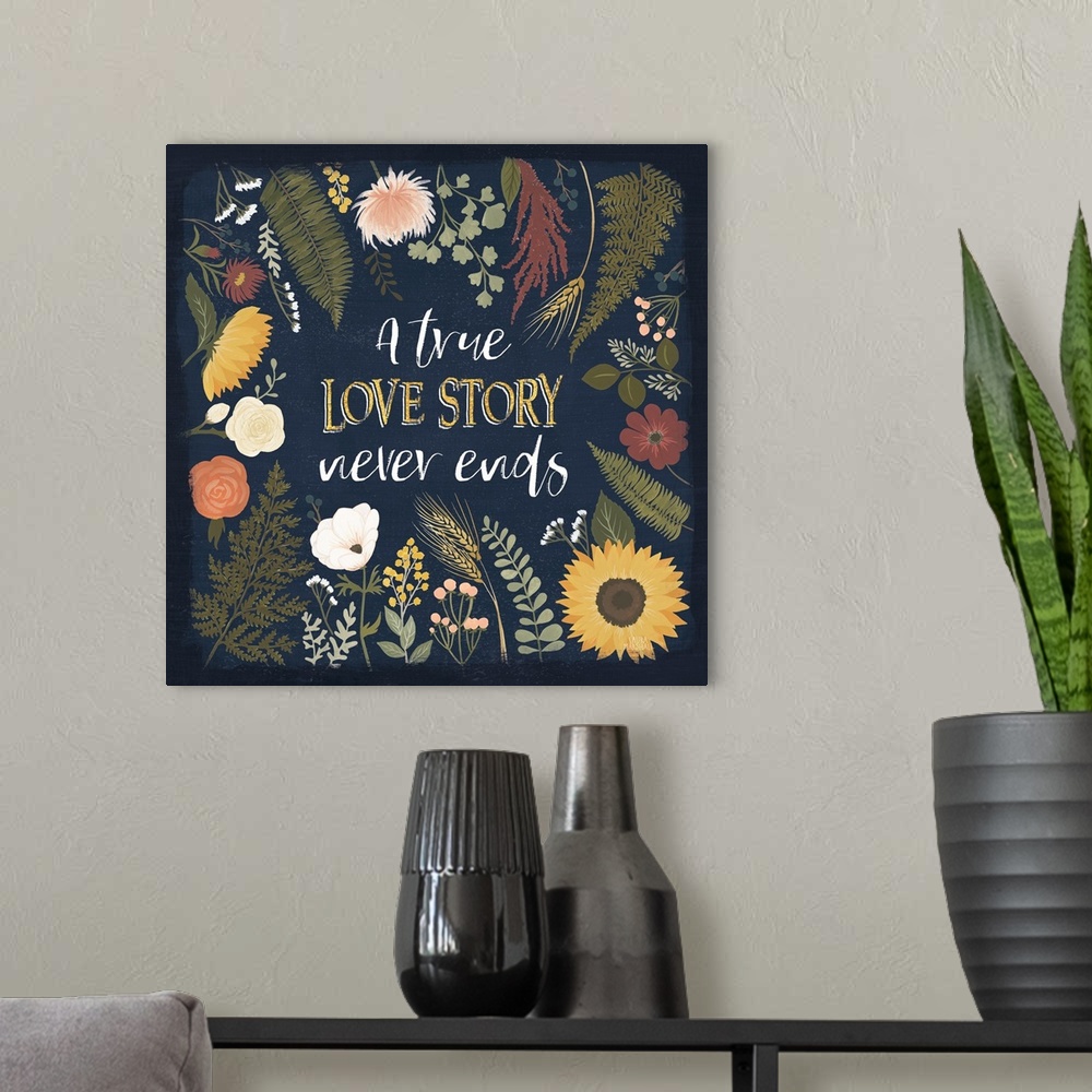 A modern room featuring Decorative floral artwork featuring autumn colors and the words, 'A true love story never ends'.