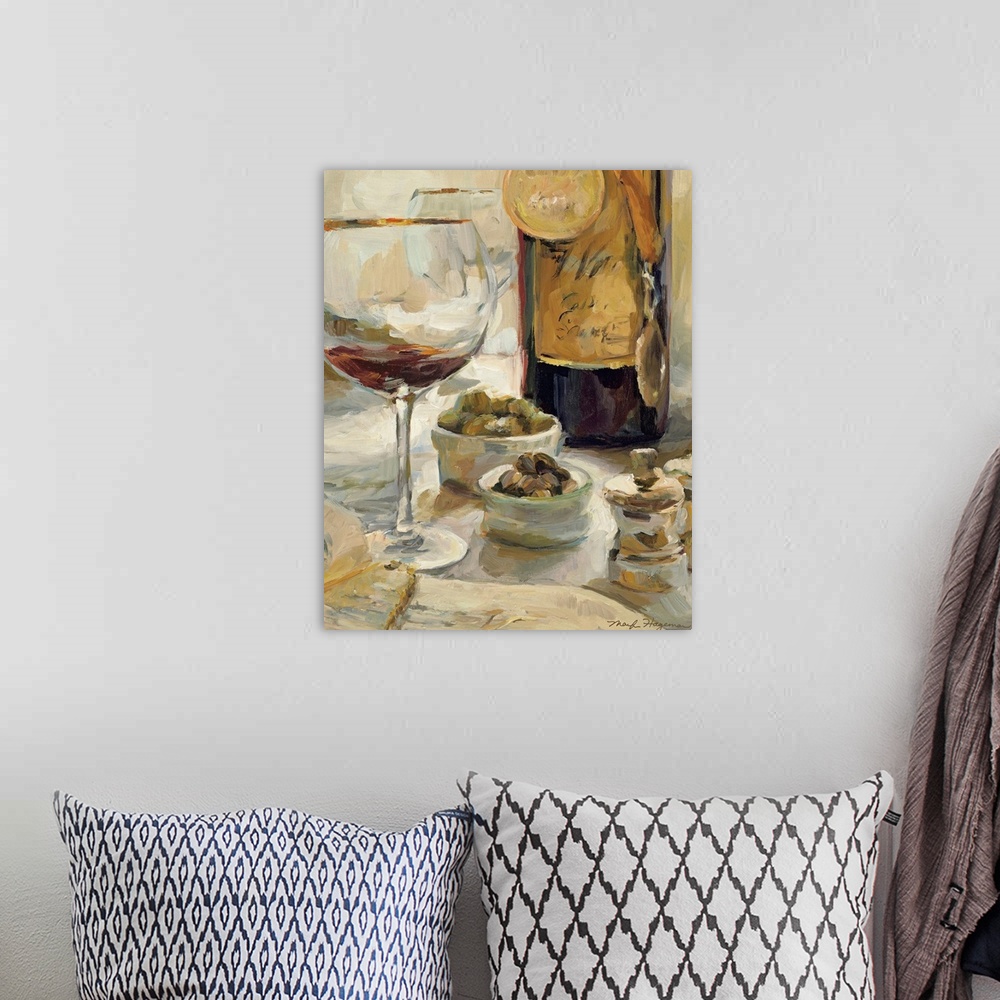 A bohemian room featuring Painting depicting a nearly empty glass of wine and a wine bottle with award medals hanging aroun...