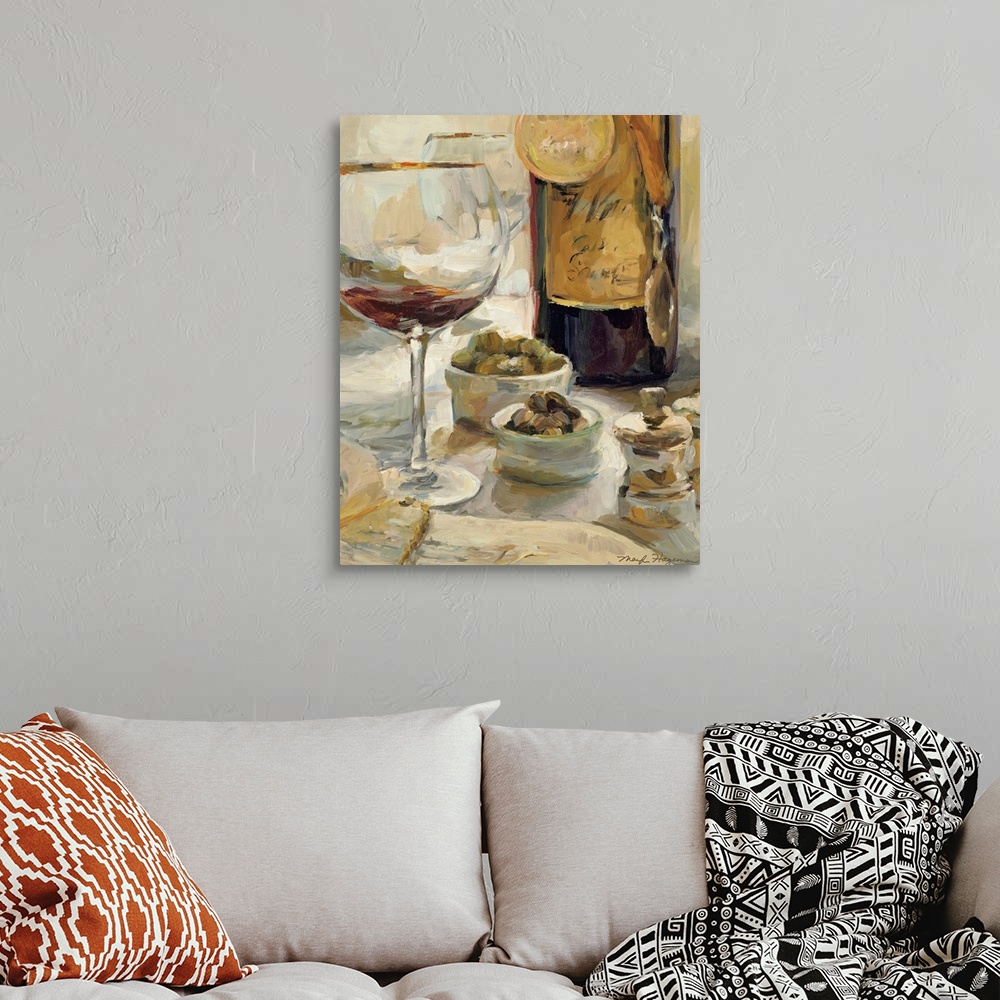 A bohemian room featuring Painting depicting a nearly empty glass of wine and a wine bottle with award medals hanging aroun...