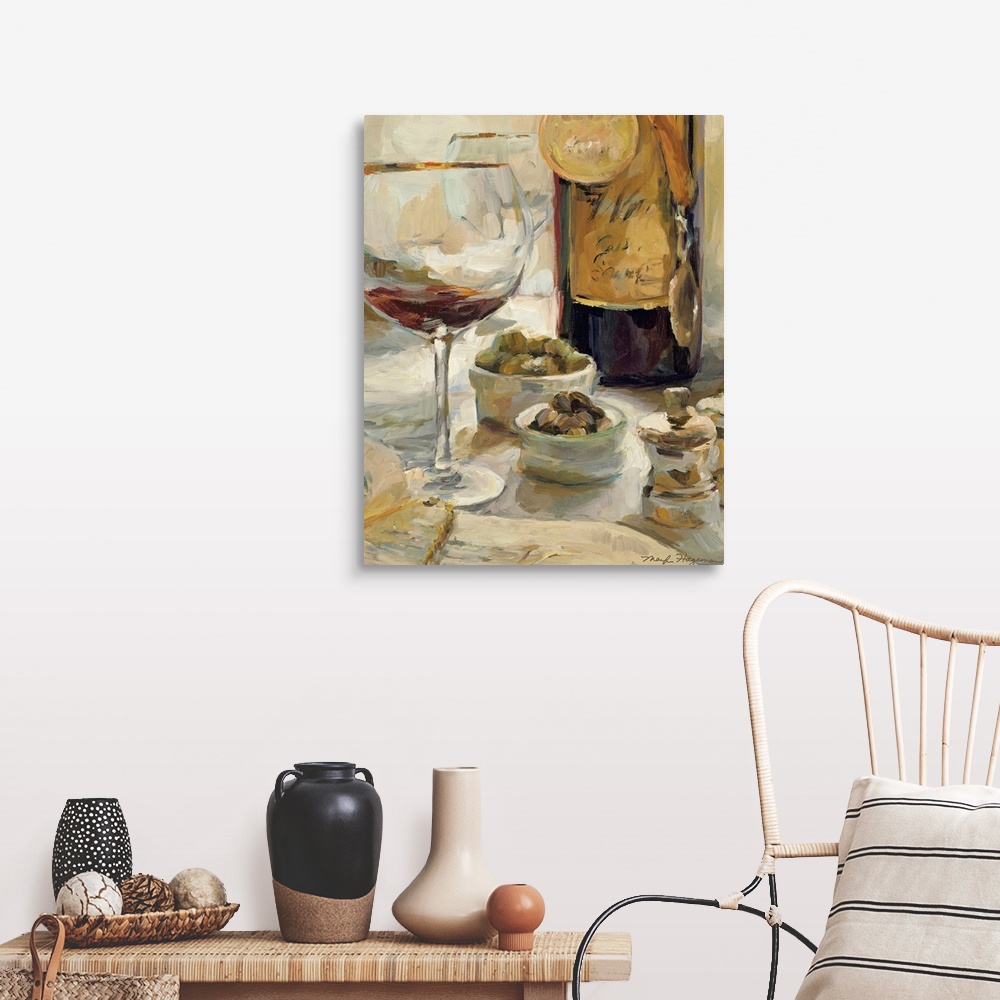 A farmhouse room featuring Painting depicting a nearly empty glass of wine and a wine bottle with award medals hanging aroun...