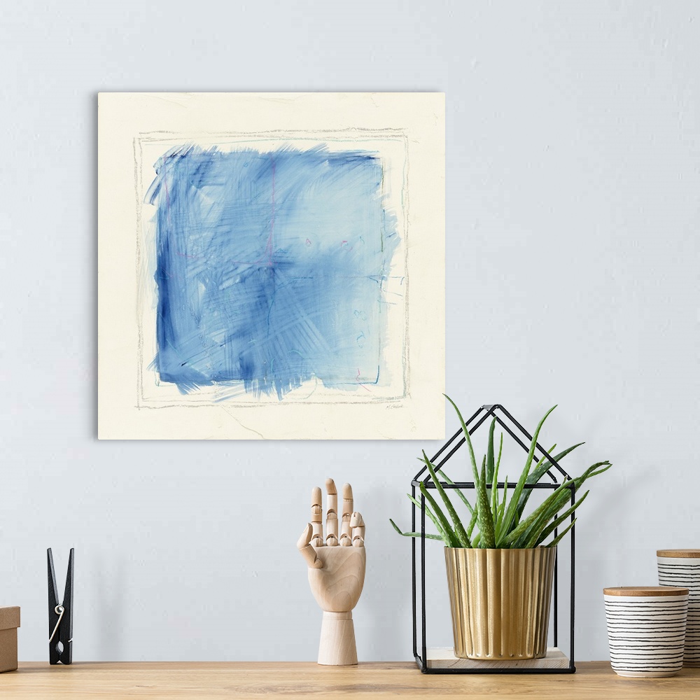 A bohemian room featuring Abstract artwork with a blue square inside of pencil drawn squares on a white square background.