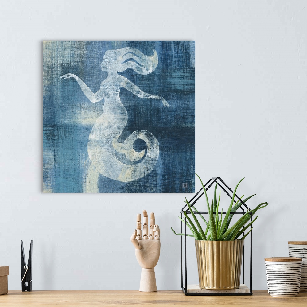 A bohemian room featuring Square artwork of a white mermaid among a white and blue brushed finish.