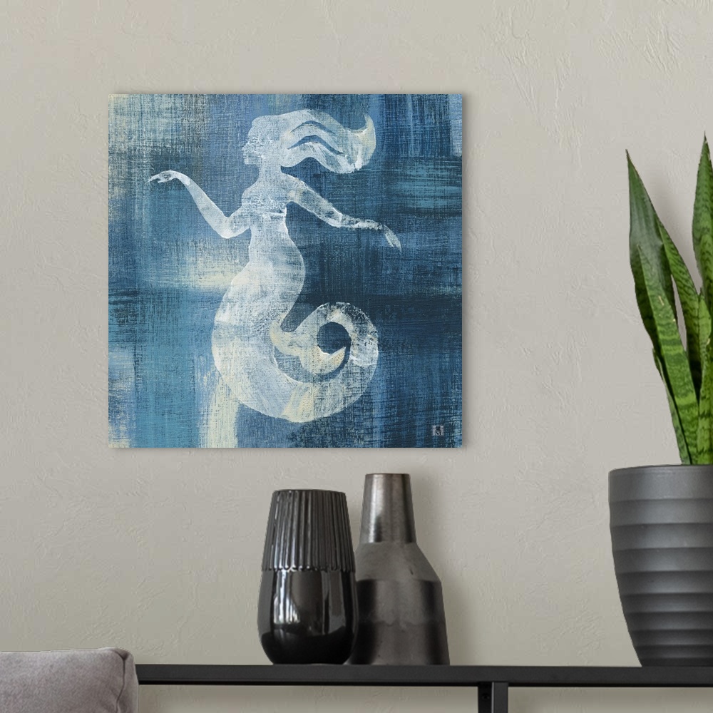 A modern room featuring Square artwork of a white mermaid among a white and blue brushed finish.