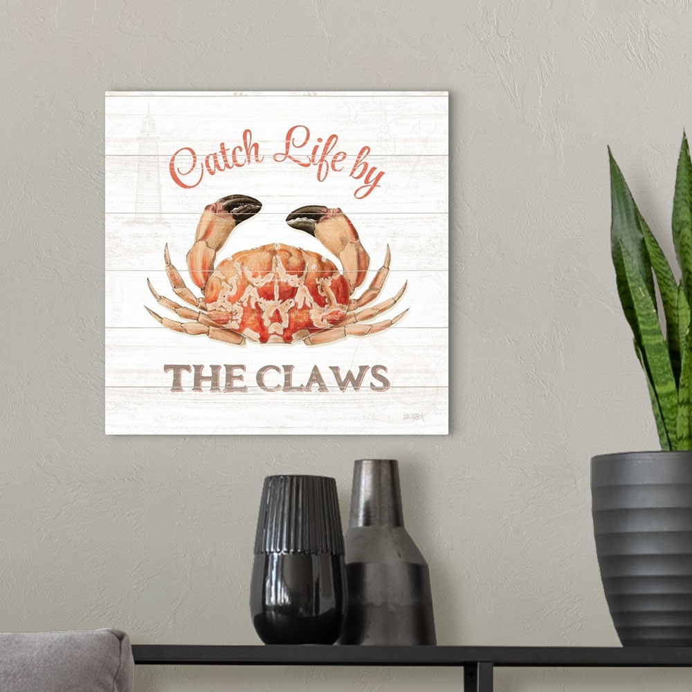 A modern room featuring Square beach decor with "Catch Life by The Claws" written around an illustration of a crab, on a ...