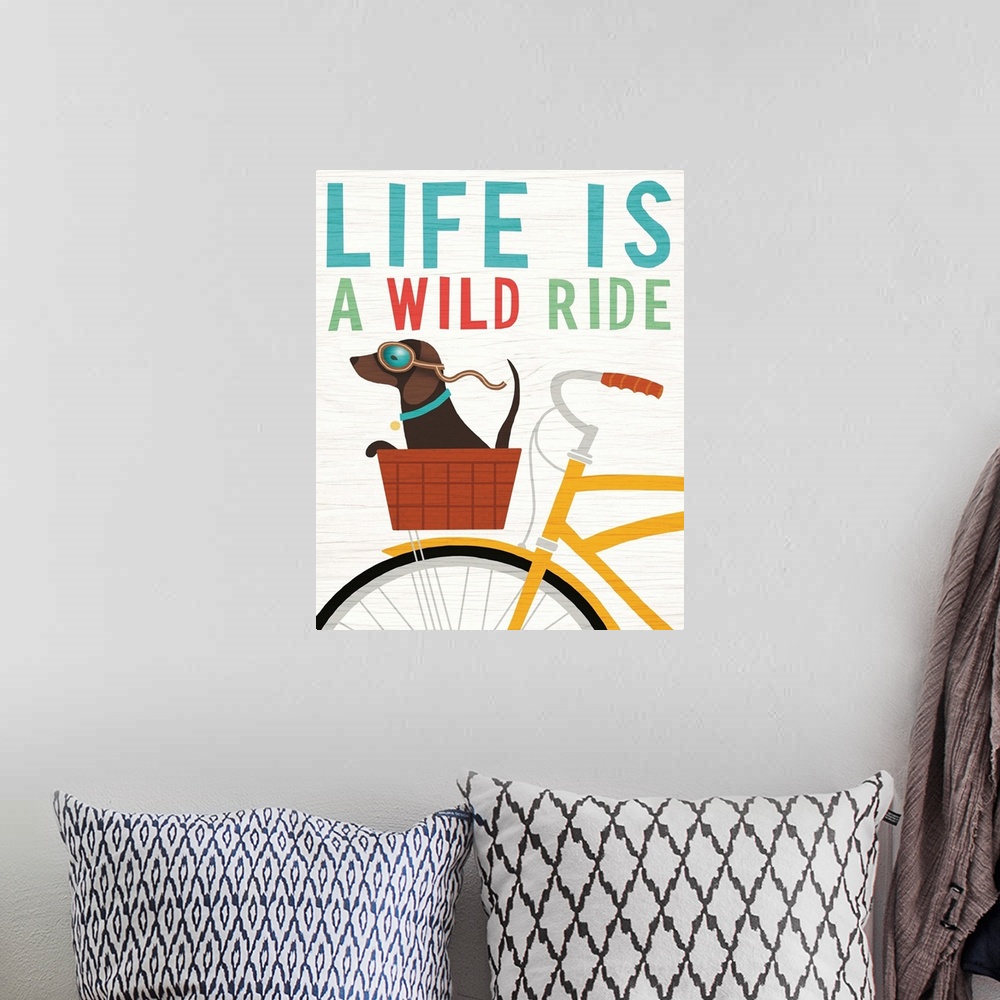 A bohemian room featuring Illustration of a dachshund riding in the basket of a yellow bicycle with goggles on and the phra...