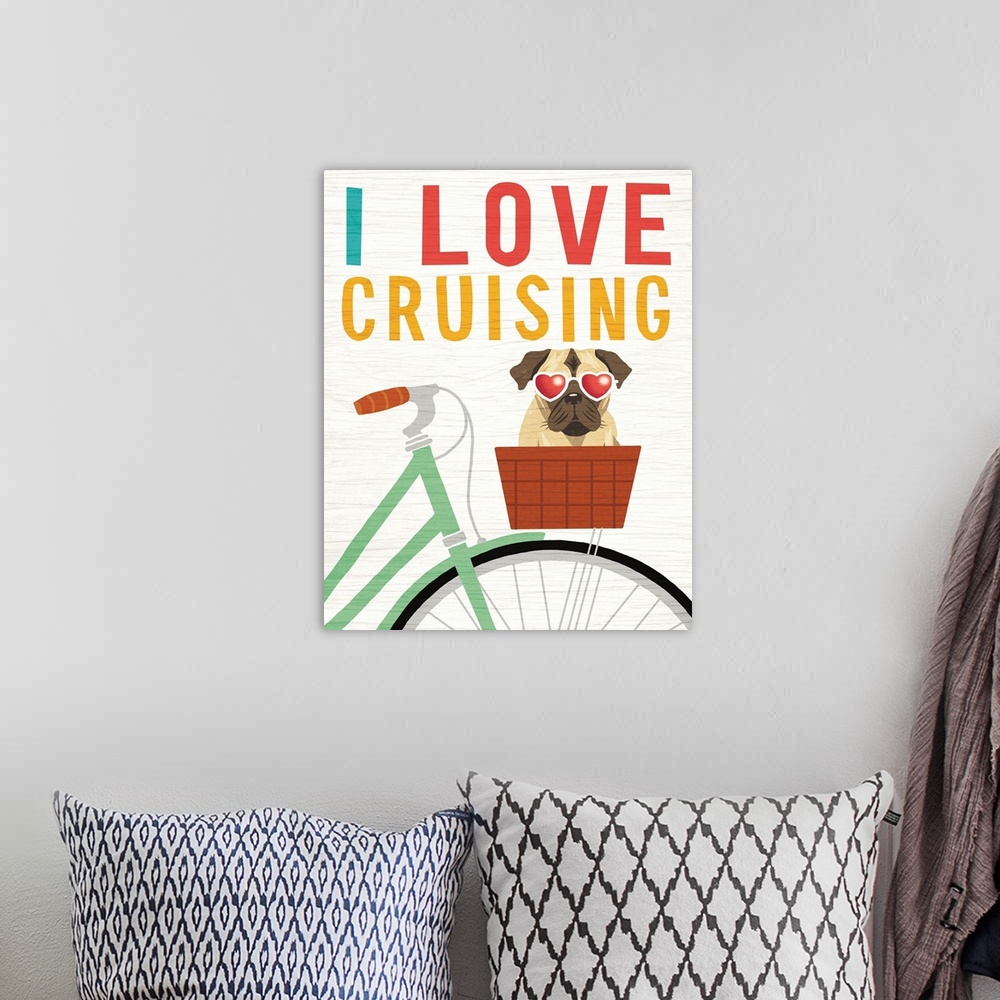 A bohemian room featuring "I Love Cruising" illustration of a pug in the basket of a bicycle wearing heart shaped sunglasse...
