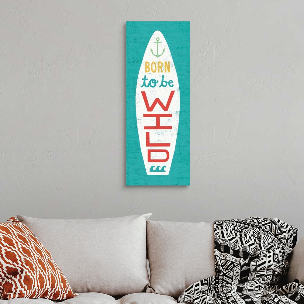 A bohemian room featuring "Born to Be Wild" surfboard decorated with an anchor and waves on a blue background.