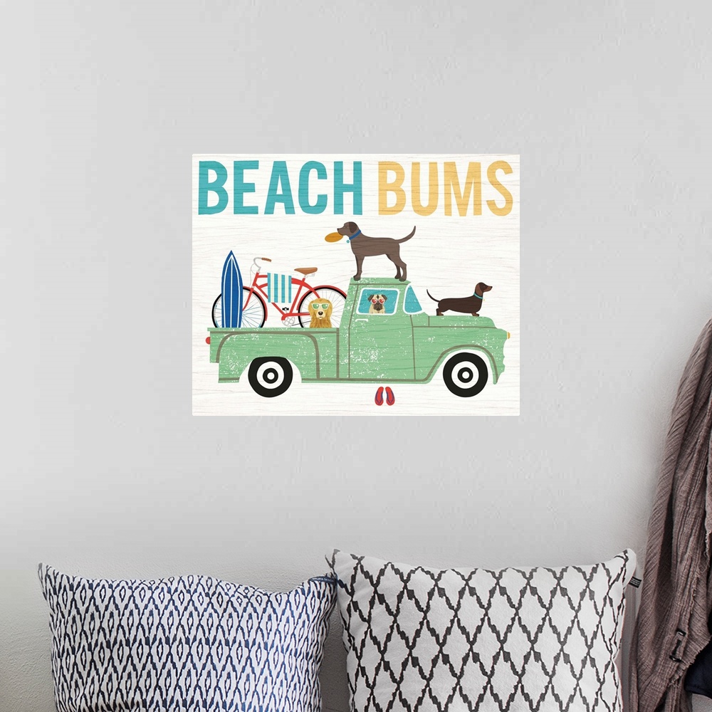 A bohemian room featuring "BEACH BUMS" illustration of four dogs in a green truck heading to the beach.