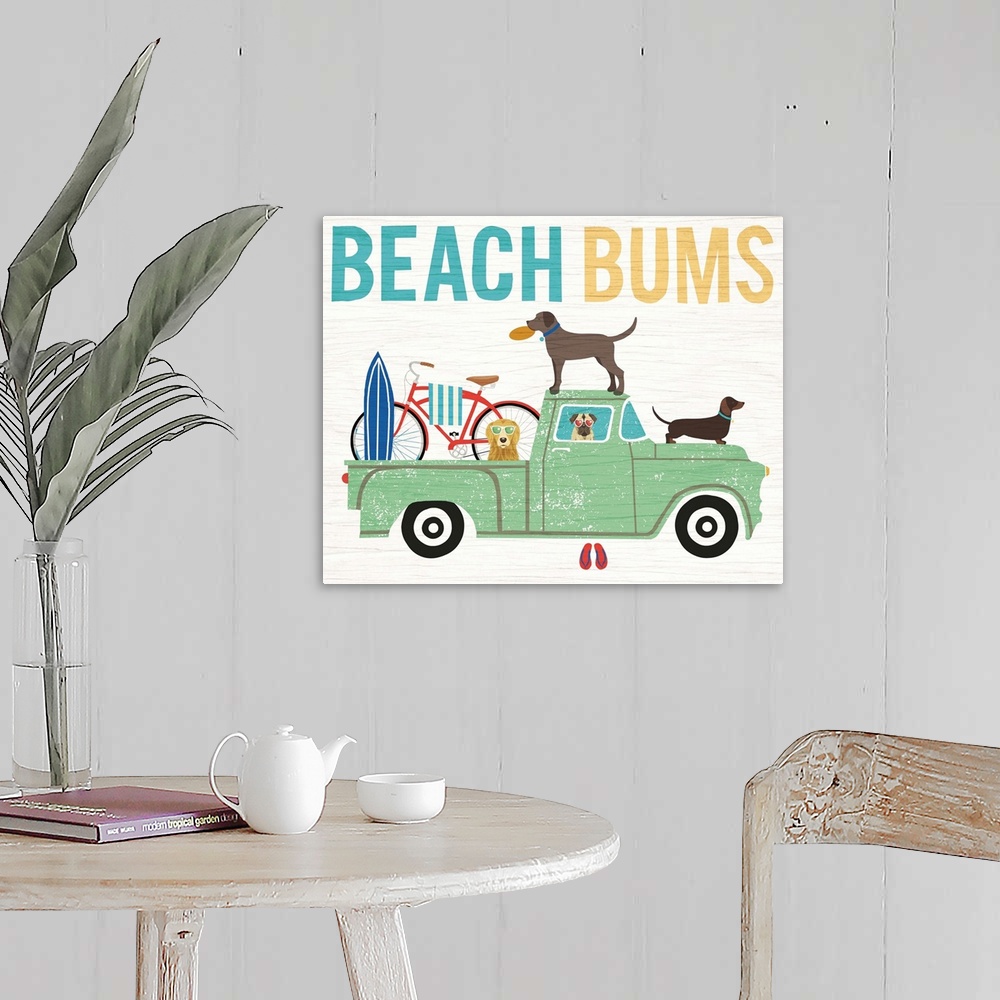 A farmhouse room featuring "BEACH BUMS" illustration of four dogs in a green truck heading to the beach.