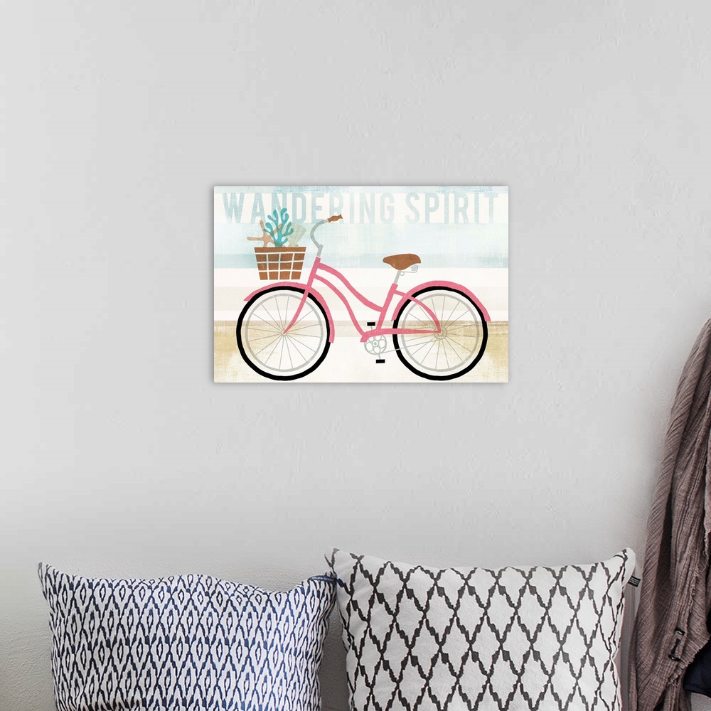 A bohemian room featuring "Wandering Spirit" with an illustration of a pink bicycle with a basket of seashells on a blue, w...