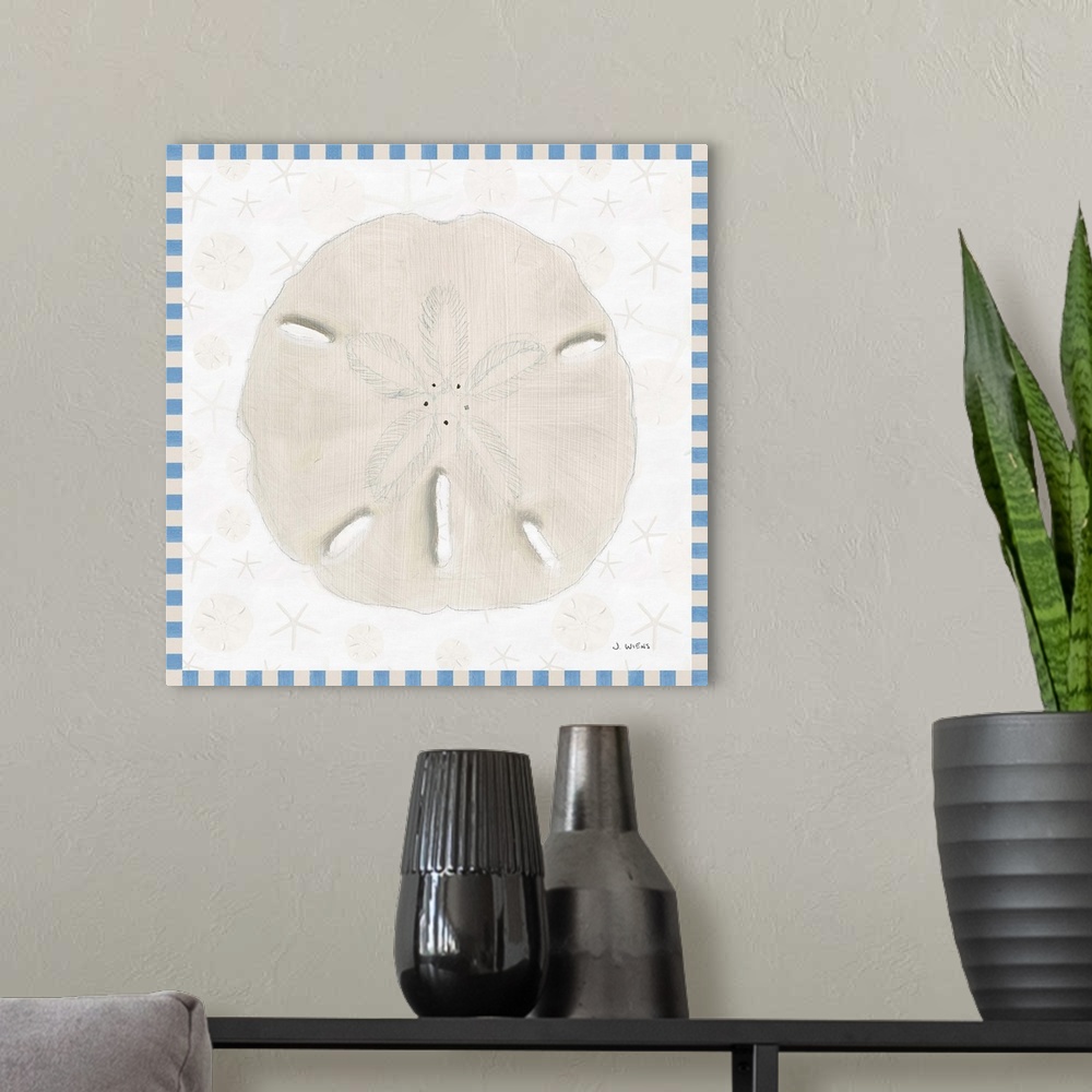 A modern room featuring Painted beach decor with a single sand dollar in the center and a blue and off-white checkered bo...