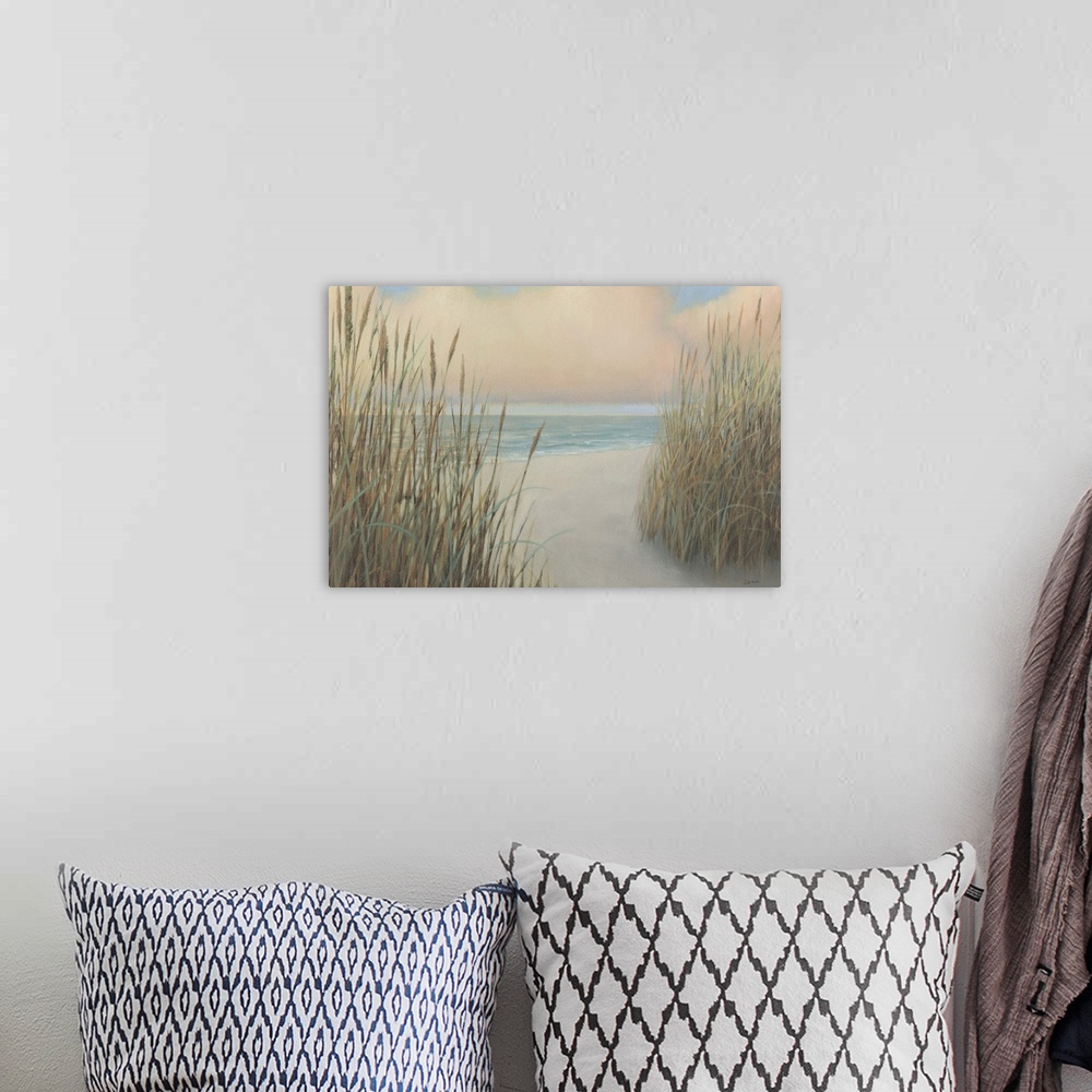 A bohemian room featuring Contemporary painting of tall sand dune grass opening to view a calm seascape under pink puffy cl...