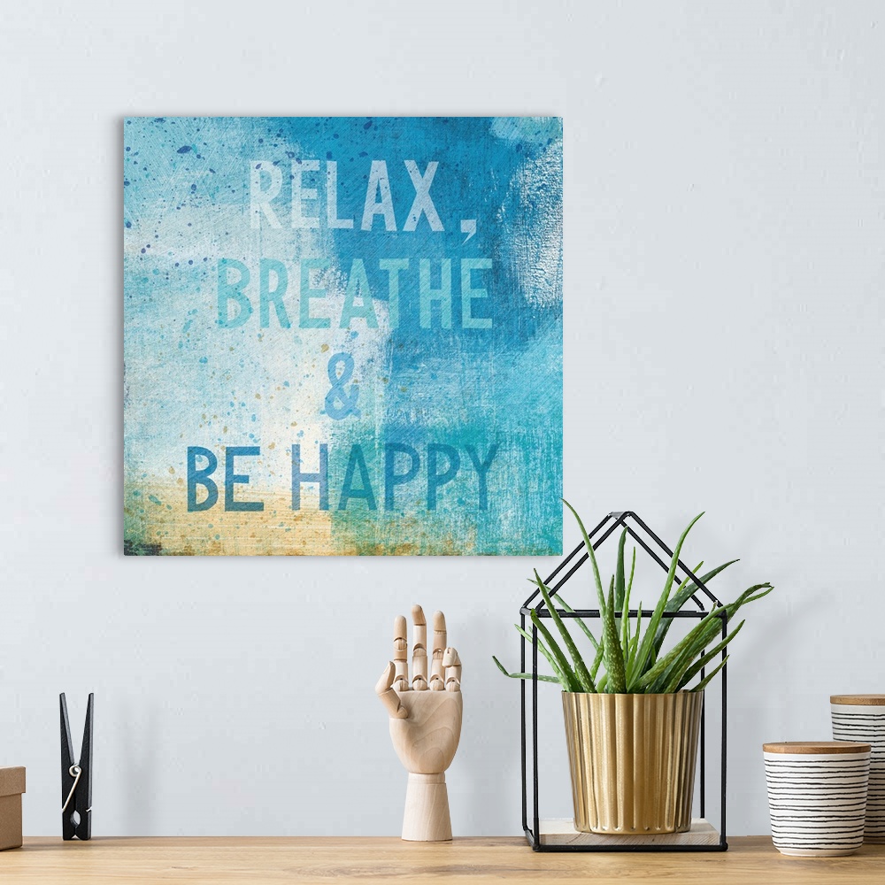 A bohemian room featuring "Relax, Breathe, and Be Happy"