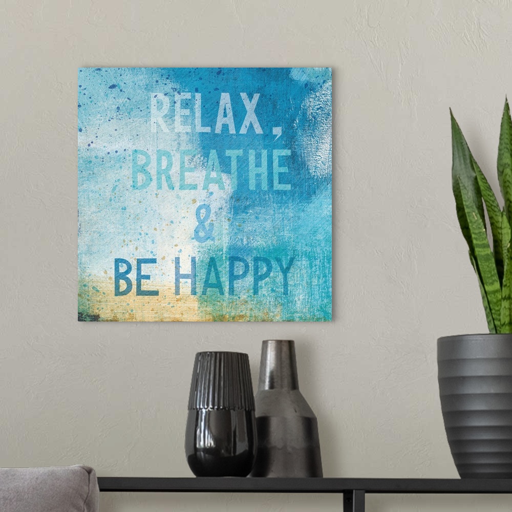 A modern room featuring "Relax, Breathe, and Be Happy"
