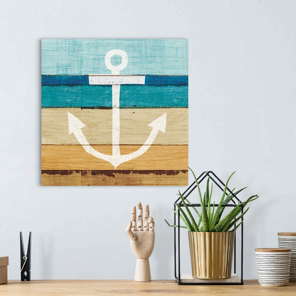 A bohemian room featuring White anchor on a blue and brown painted wood background.
